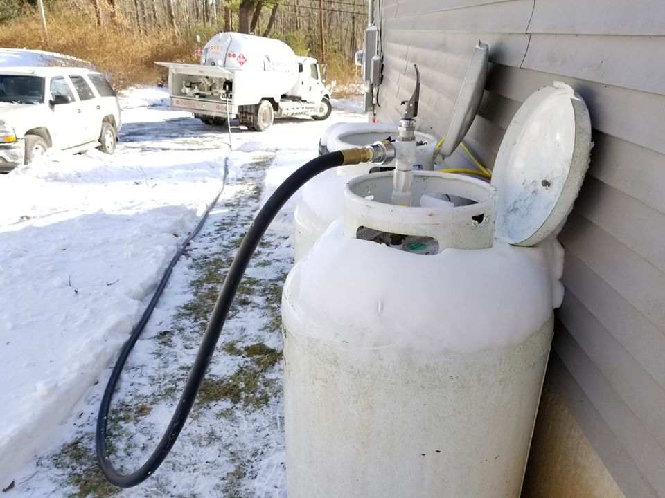 white tank being filled