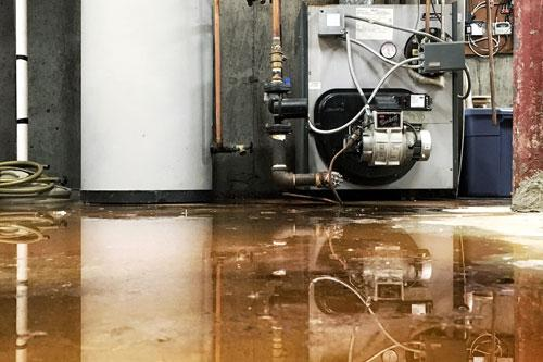 Flooded basement oil furnace